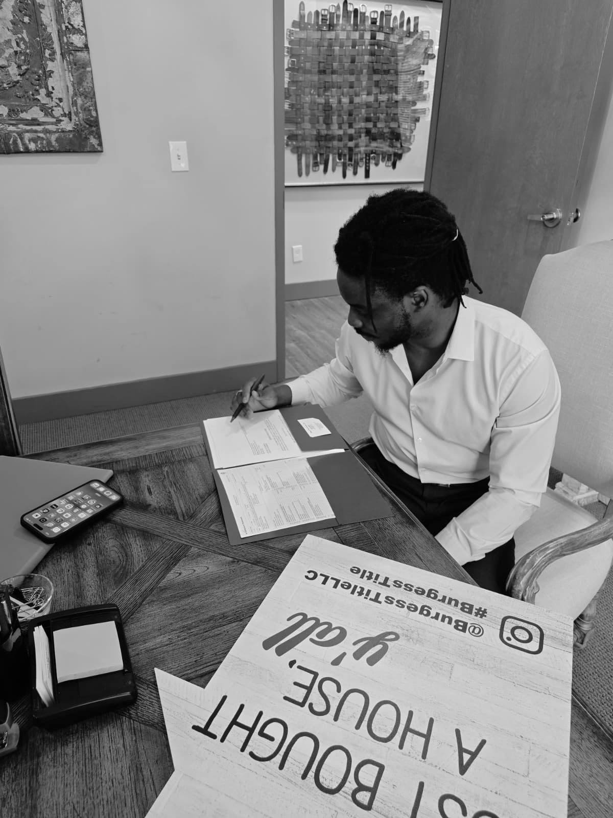 Victor Bomi at a real estate investment closing